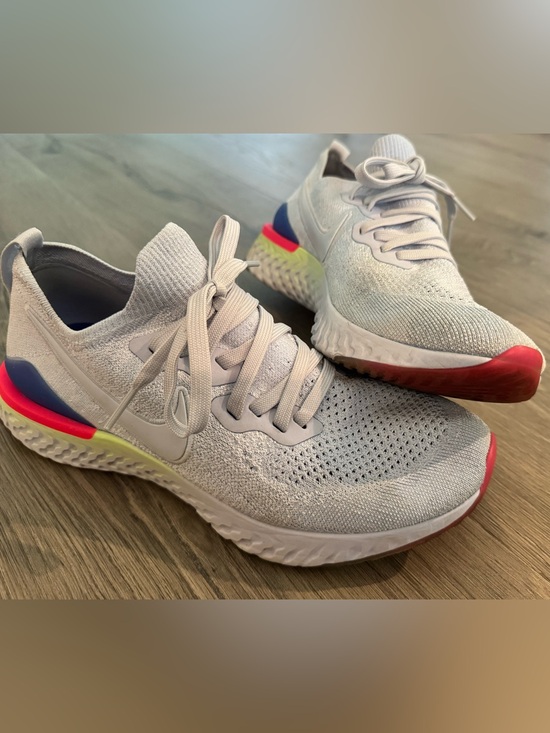 Nike Shoes - Nike Epic Reacts Women’s Flyknit Running Sneakers with Pink and Blue Accents
